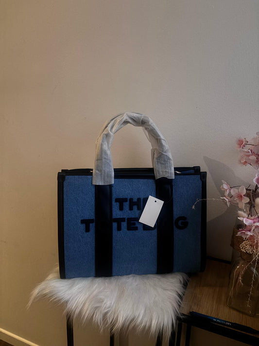 Prachtige "The Tote bag" licht jeans met zwart