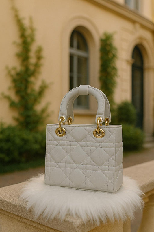 Klein schattig beige handtasje